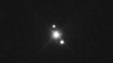 Hubble image of Haumea and two faint moons